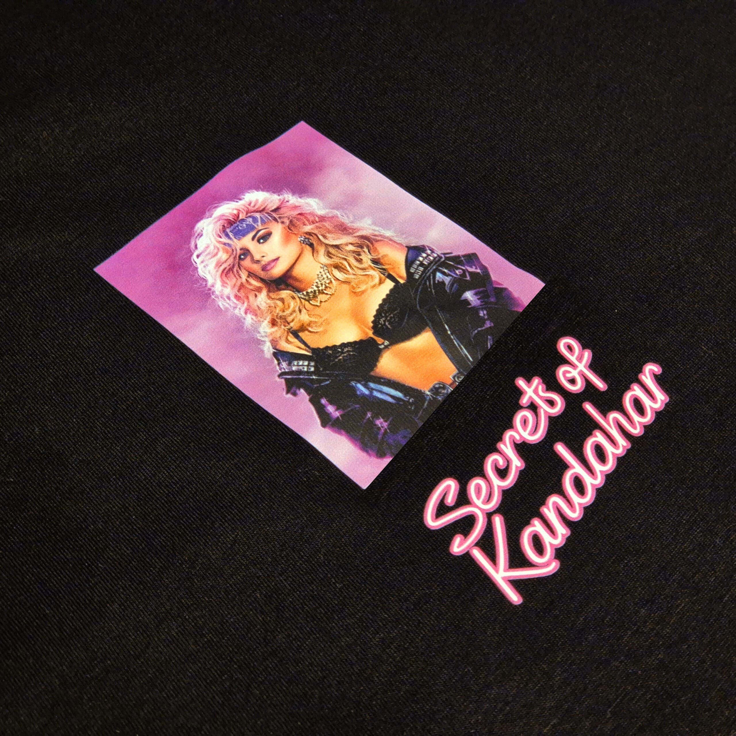 Secrets of Kandahar - Triko detail potisku předek