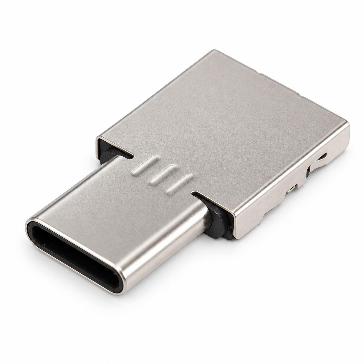Mini OTG adaptér USB-C s kovovým tělem, pohled shora na bílém pozadí.